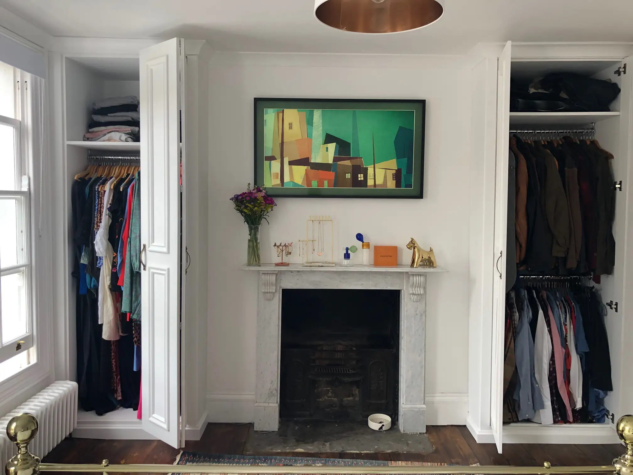 Bespoke fitted wardrobes with custom doors.